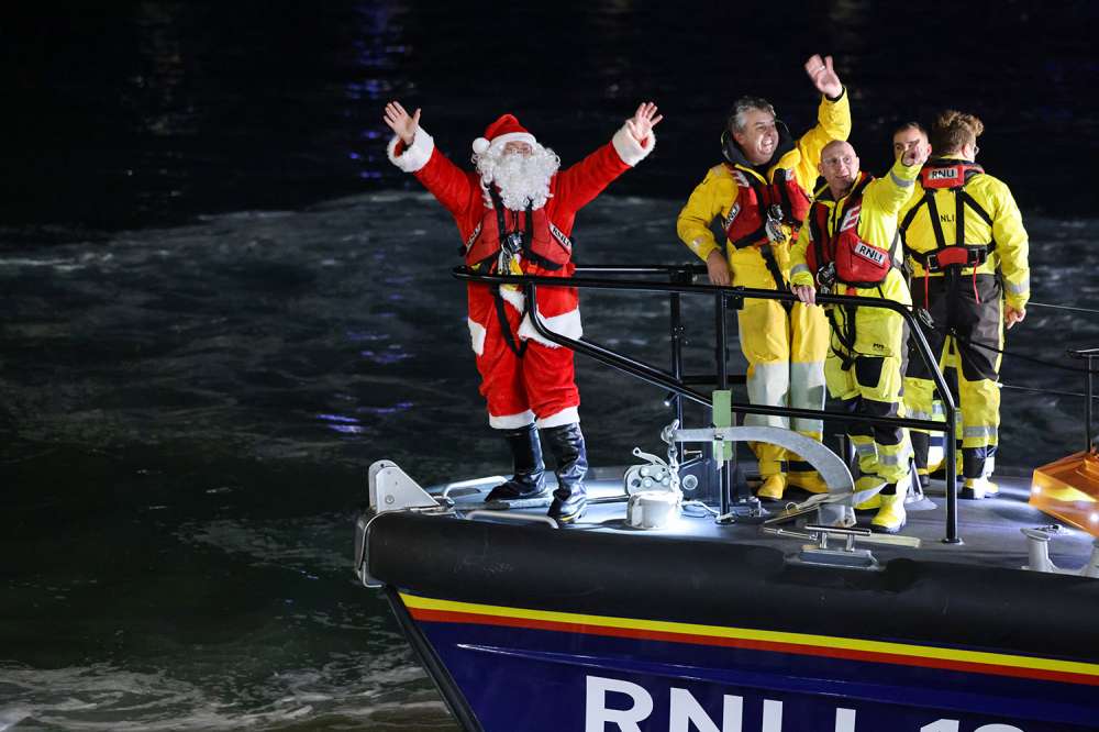 Santa Arrives in Style at St Ives Harbour for Christmas Light Switch-On